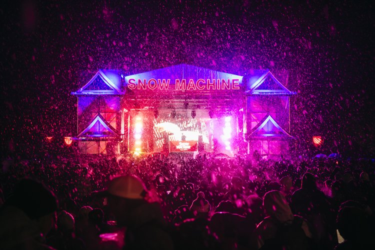snow machine colorful stage at night